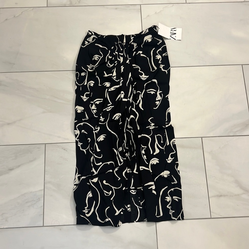 NWT MIDI skirt with center slit